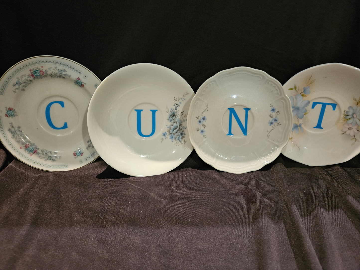CUNT saucer set