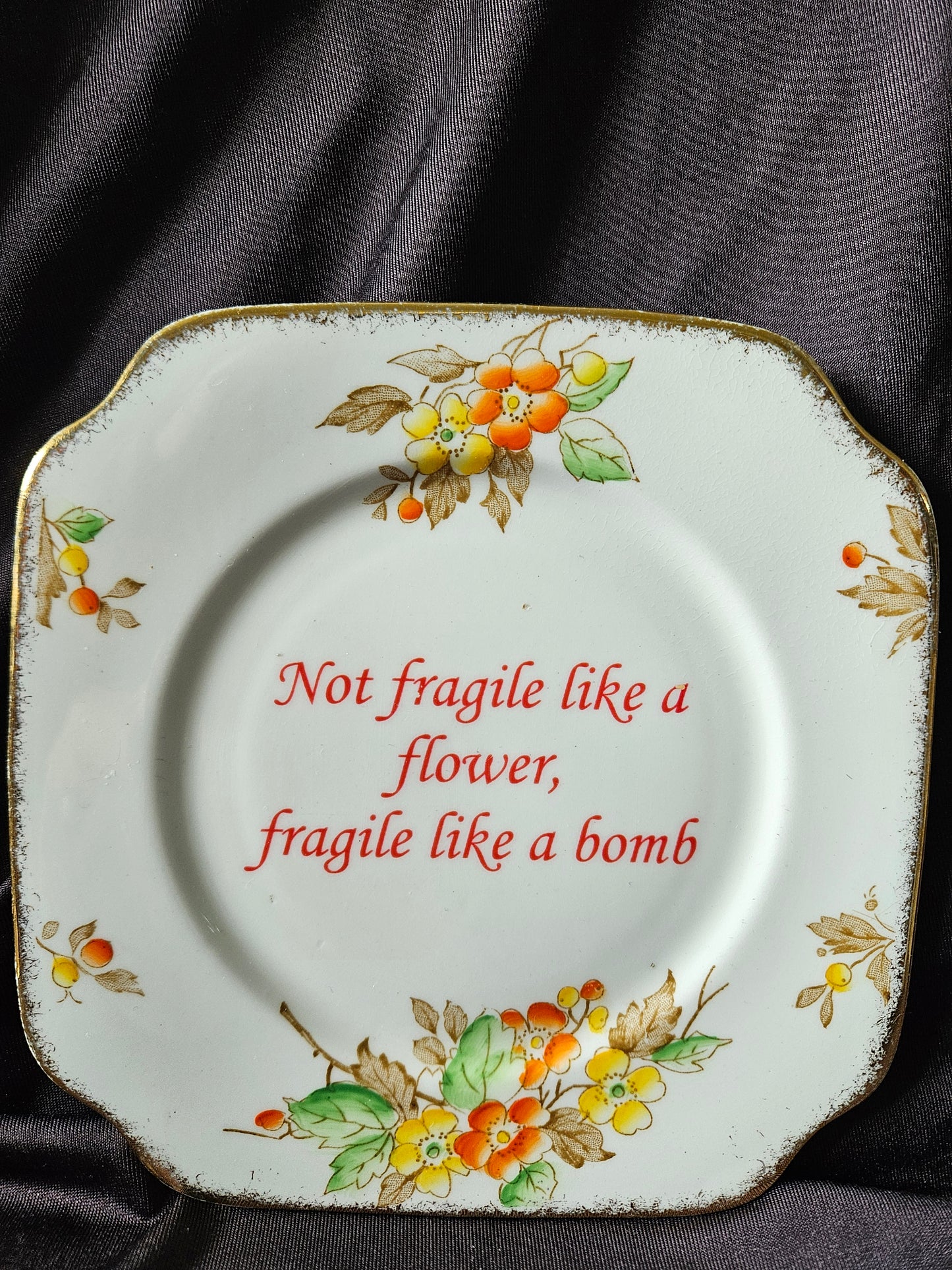 Not fragile like a flower, Fragile like a bomb Plate