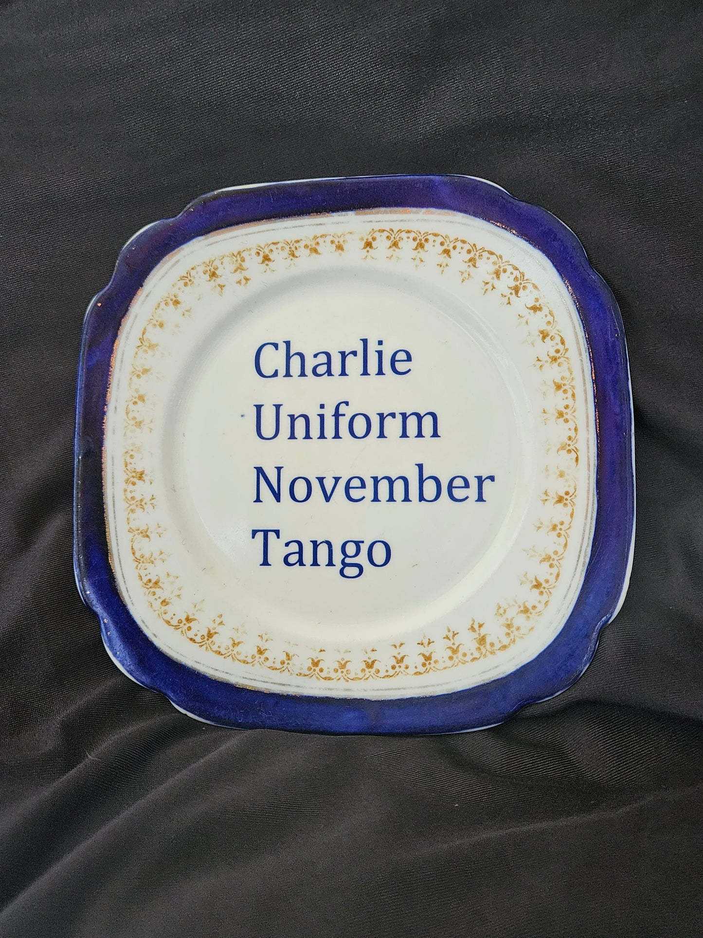 Charlie, Uniform, November, Tango Plate