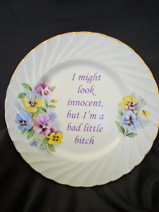 I might look innocent, but I'm a bad little bitch Plate