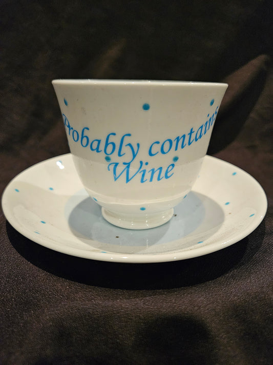 Probably contains Wine teacup and saucer