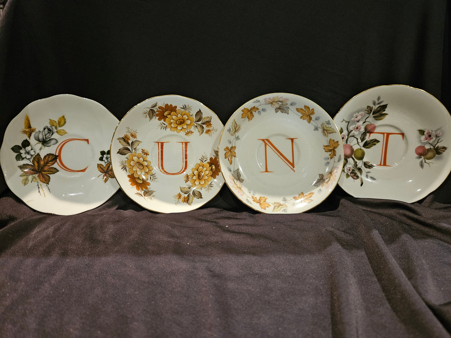 CUNT saucer set