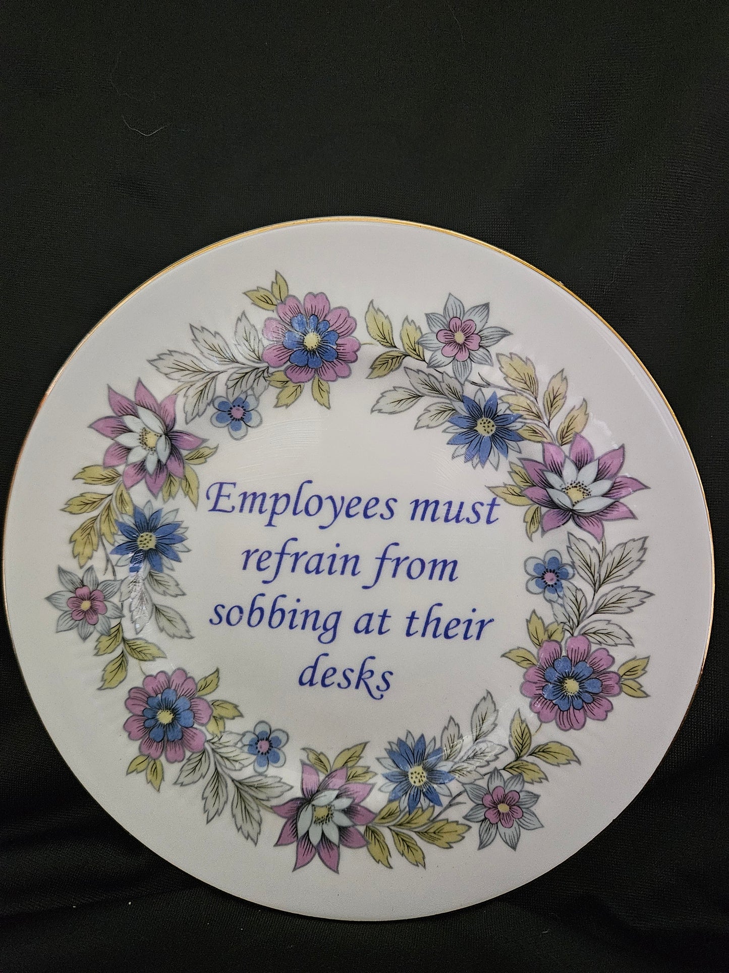Employees must refrain from sobbing at their desks plate
