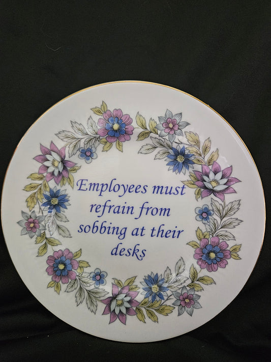 Employees must refrain from sobbing at their desks plate
