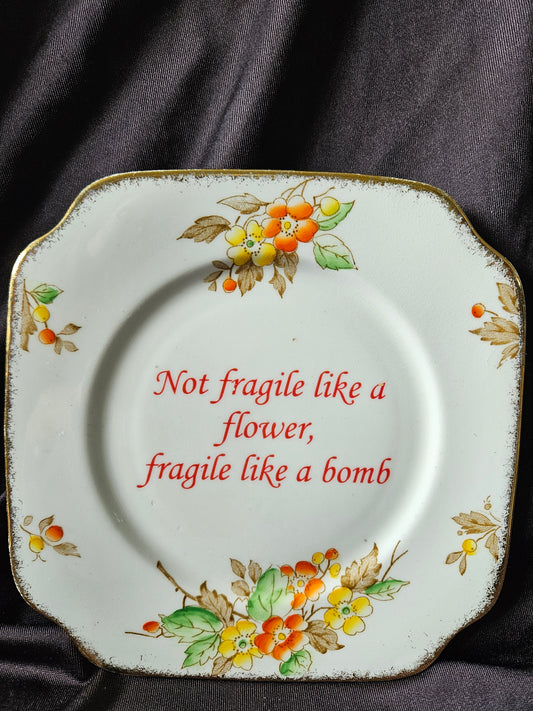 Not fragile like a flower, Fragile like a bomb Plate