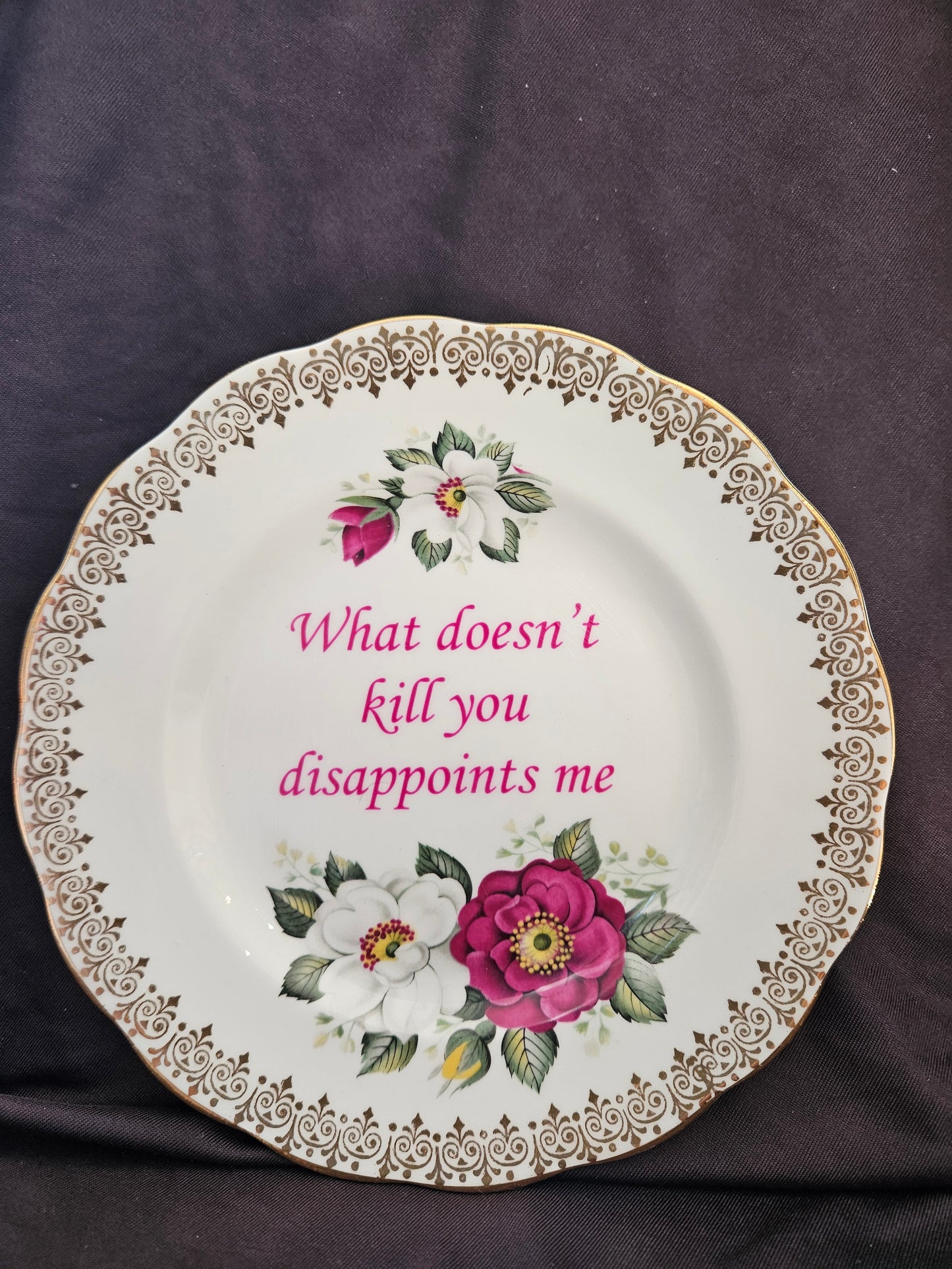 What doesn't kill you disappoints me Plate