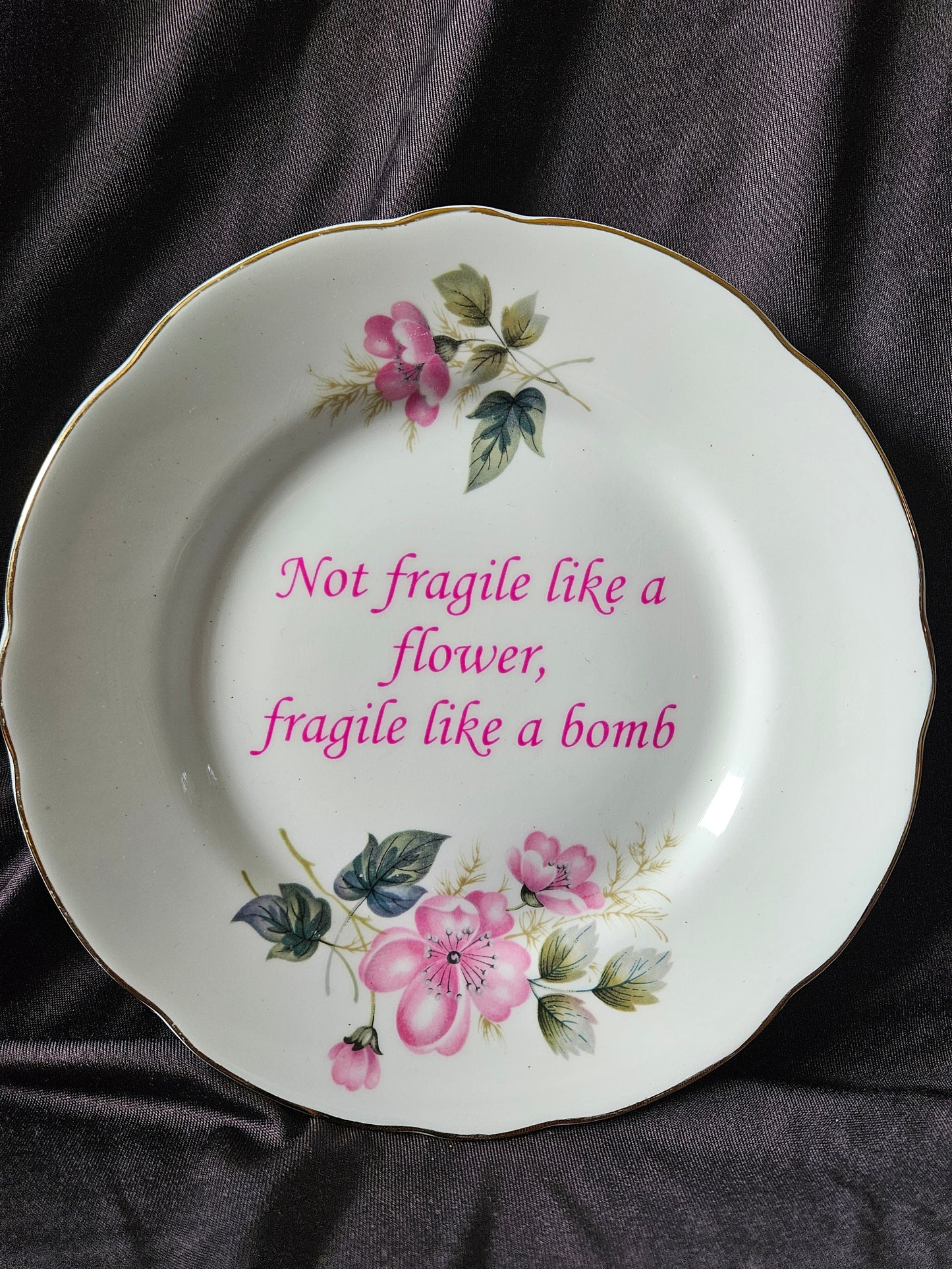 Not fragile like a flower, Fragile like a bomb Plate
