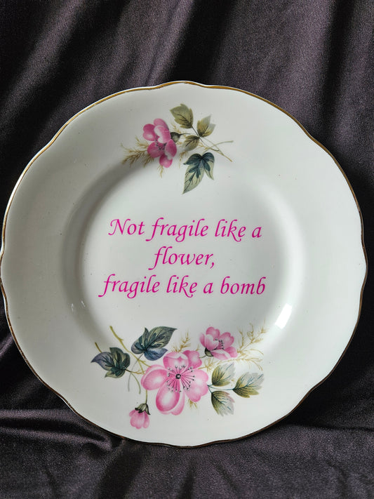 Not fragile like a flower, Fragile like a bomb Plate